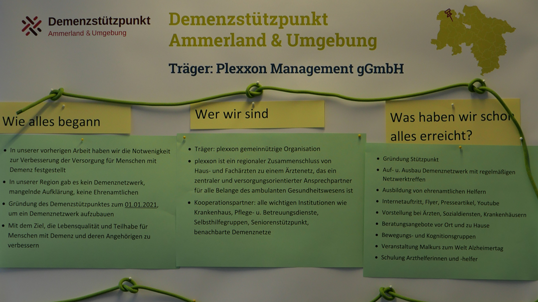 Foto: Infoplakat über Demenzstützpunkt Ammerland & Umgebung mit den Spalten "Wie alles begann", "Wer wir sind" und "Was haben wir schon erreicht?!